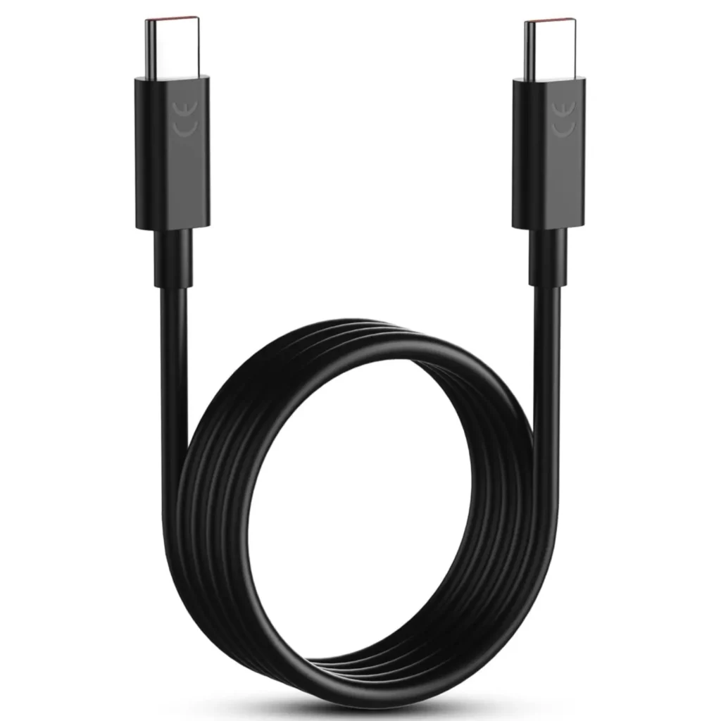 Black USB-C to USB-C charging and data cable coiled on a white background
